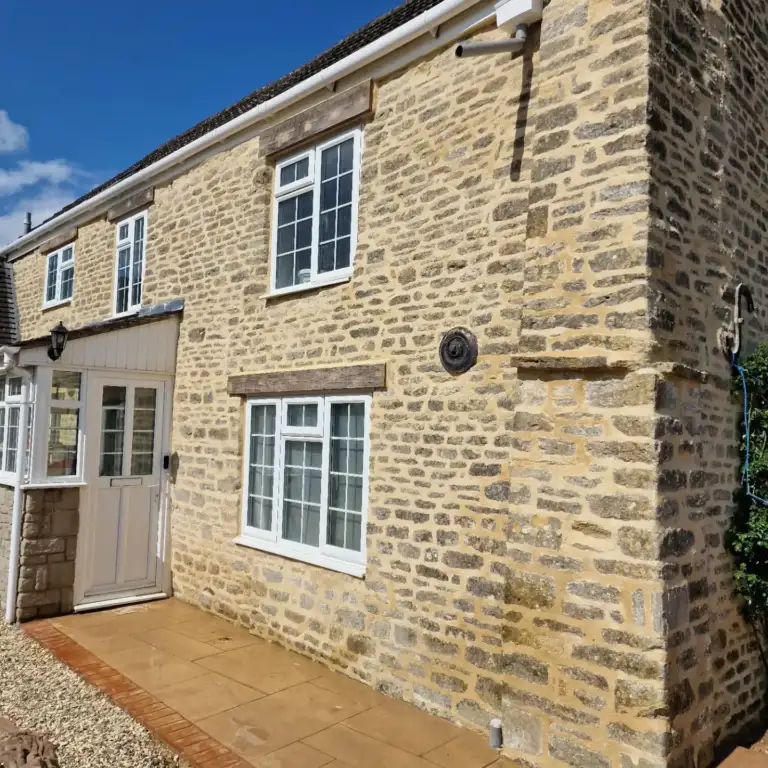 Cotswold stone house after a full lime mortar repoint