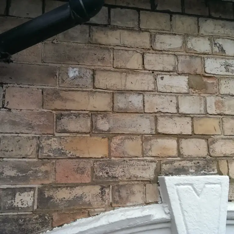 Victorian bay-fronted brick house repointed in lime mortar
