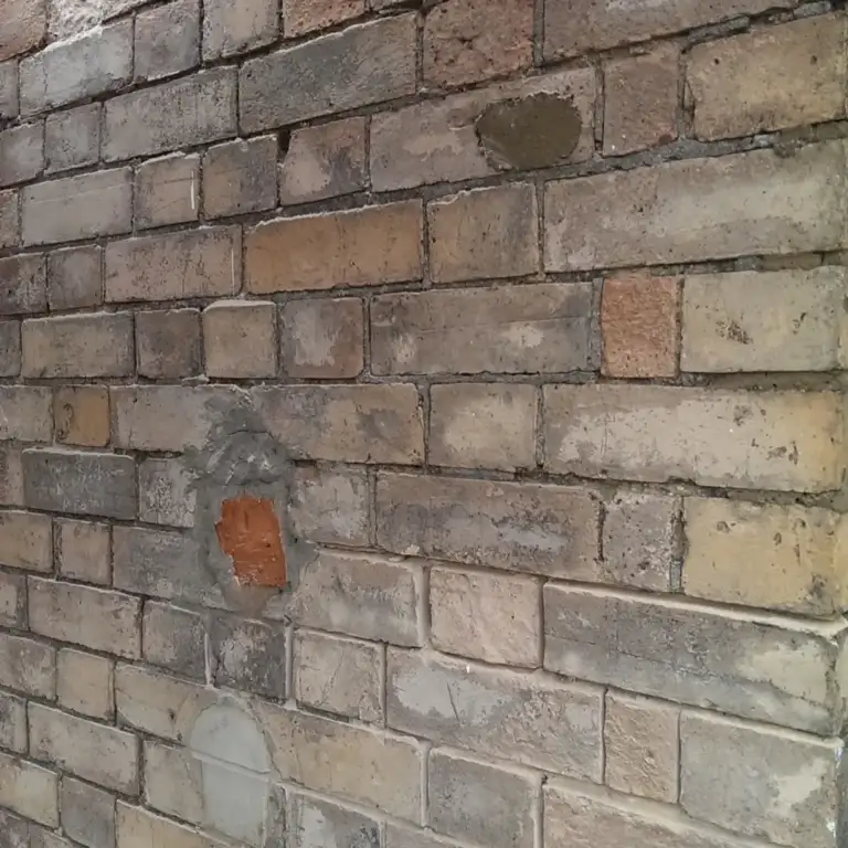 Victorian bay-fronted brick house repointed in lime mortar