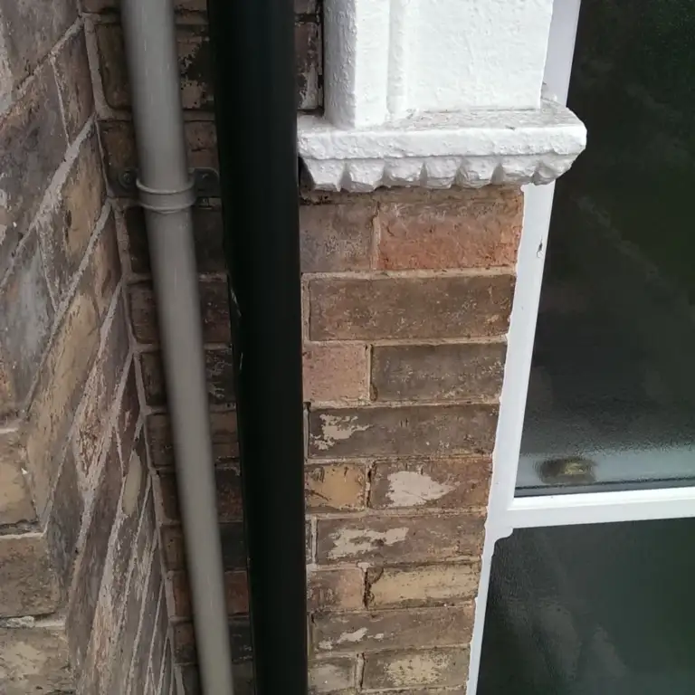 Victorian bay-fronted brick house repointed in lime mortar