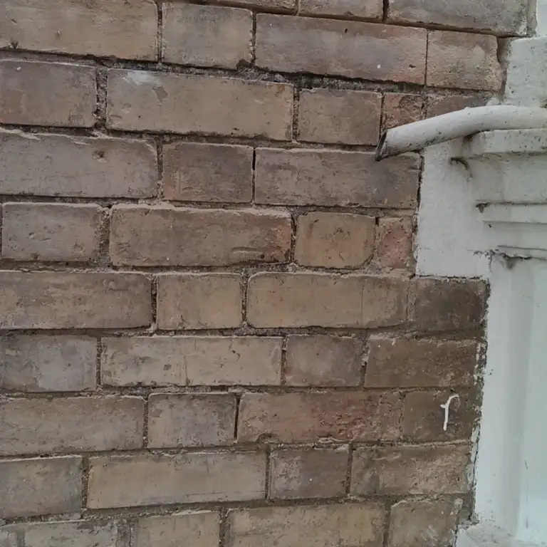 Victorian bay-fronted brick house repointed in lime mortar