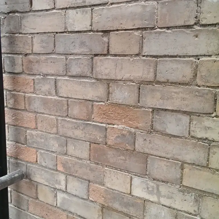 Victorian bay-fronted brick house repointed in lime mortar